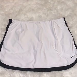 white and black nike skirt
